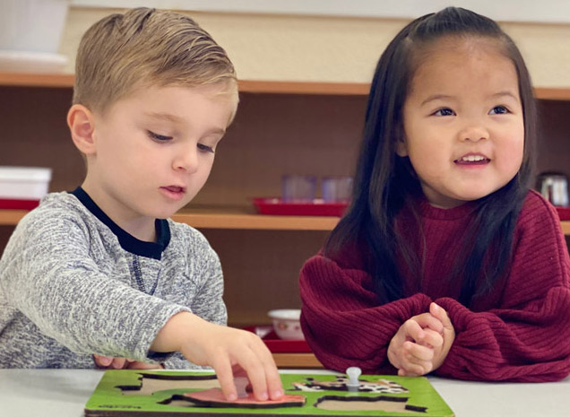 Montessori School of Mountain House teacher working with two-year old toddler program